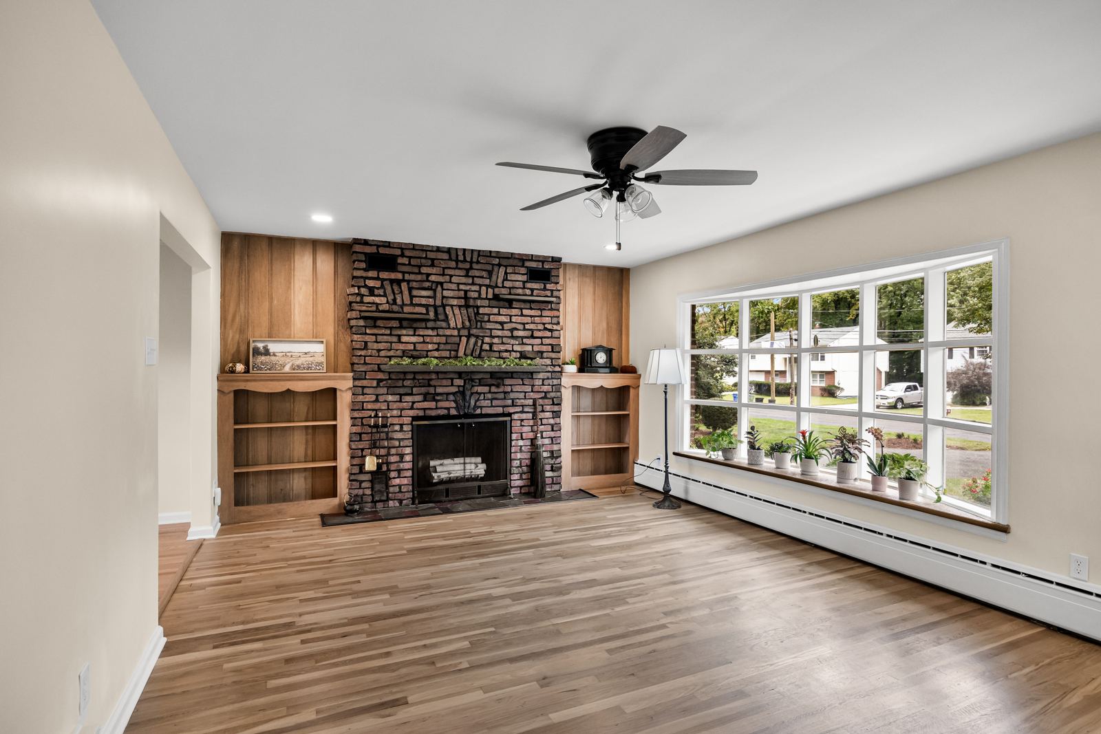 Fireplace wall and bay window